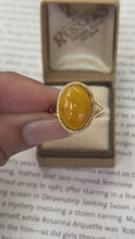 Load and play video in Gallery viewer, Vintage 10K Yellow Gold Butterscotch Amber Solitaire Ring