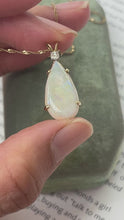 Load and play video in Gallery viewer, Vintage 14K Yellow Gold Teardrop Ethiopian Opal & Diamond Pendant Necklace