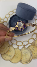 Load and play video in Gallery viewer, Vintage 10K Yellow Gold Star MoonStone, Amethyst And Pearl Bangle