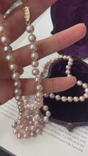 Load and play video in Gallery viewer, Vintage Pink & Purple Cultured Pearl 14K Yellow Gold Clasp Long  string  Necklace.