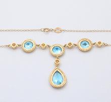 Load image into Gallery viewer, Vintage 14K Yellow Gold Teardrop Blue Zircon Festoon Necklace. Negligee Necklace