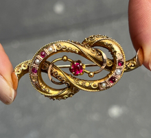 Load image into Gallery viewer, Victorian 12K Yellow Gold Ruby And Split Pearl Infinity love Knot Brooch
