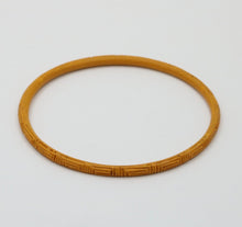 Load image into Gallery viewer, Vintage 1960’s Carved Mustard Yellow Set Four Bangles