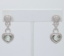 Load image into Gallery viewer, These sterling silver heart-shaped earrings will make your heart skip a beat. F
