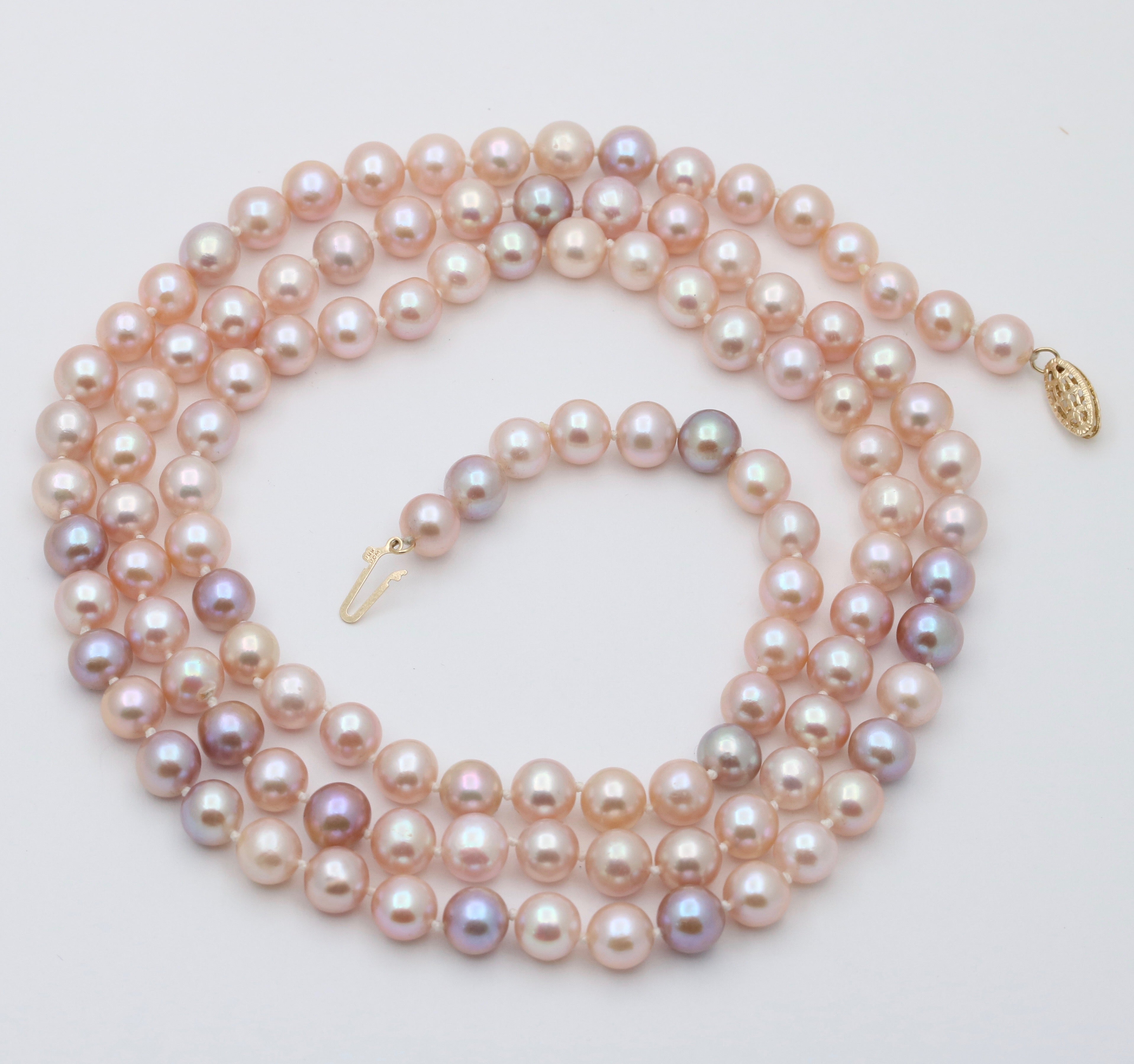 Vintage Pink & Purple Cultured Pearl 14K Yellow Gold Clasp Long  string  Necklace.