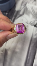 Load and play video in Gallery viewer, Vintage 14K Yellow Gold Vivid Pink Emerald Cut Bezel Set Ring
