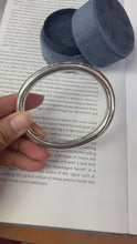 Load and play video in Gallery viewer, Tiffany &amp; Co Sterling Silver Round Tube Oval Classic Bangle
