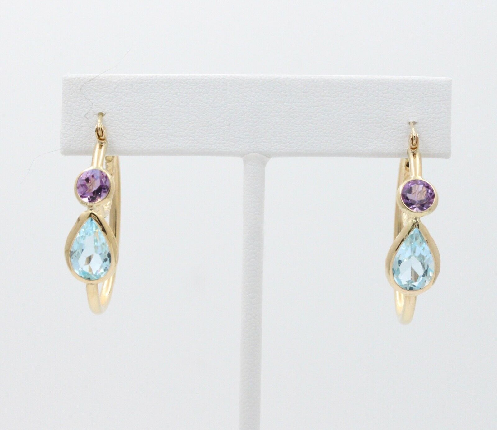 Minimalist 14K Yellow Gold Blue Topaz & Amethyst Huggie Earrings.