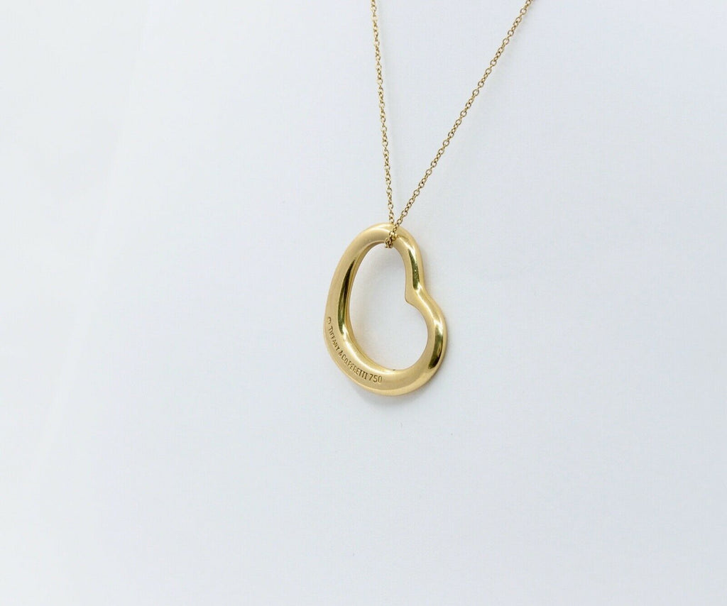 Tiffany and Co Elsa Peretti Floating Heart Pendant and Chain 18K Yellow Gold