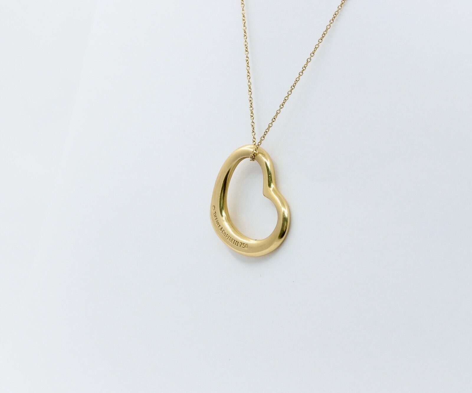 Tiffany and Co Elsa Peretti Floating Heart Pendant and Chain 18K Yellow Gold