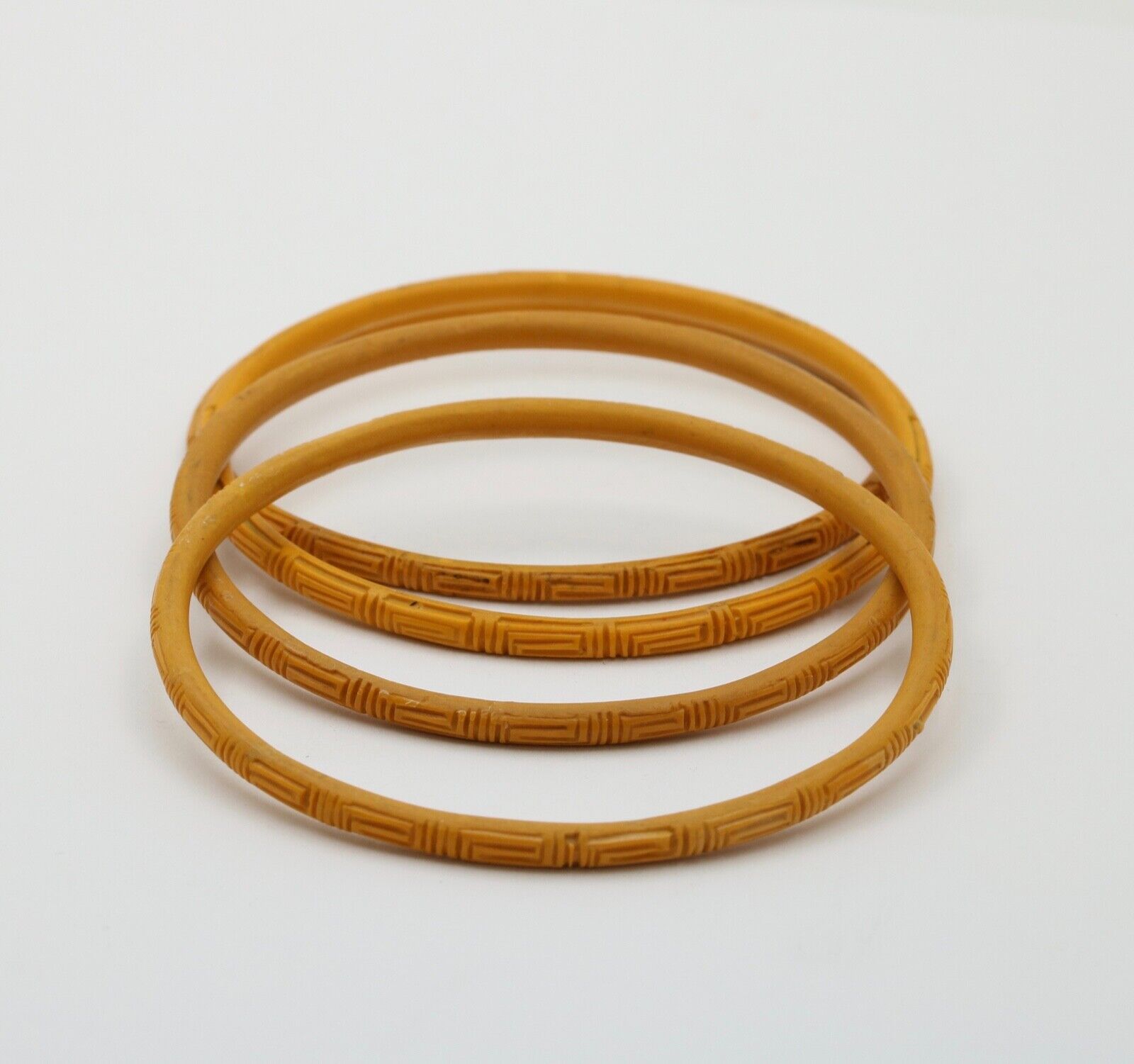 Vintage 1960’s Carved Mustard Yellow Set Four Bangles