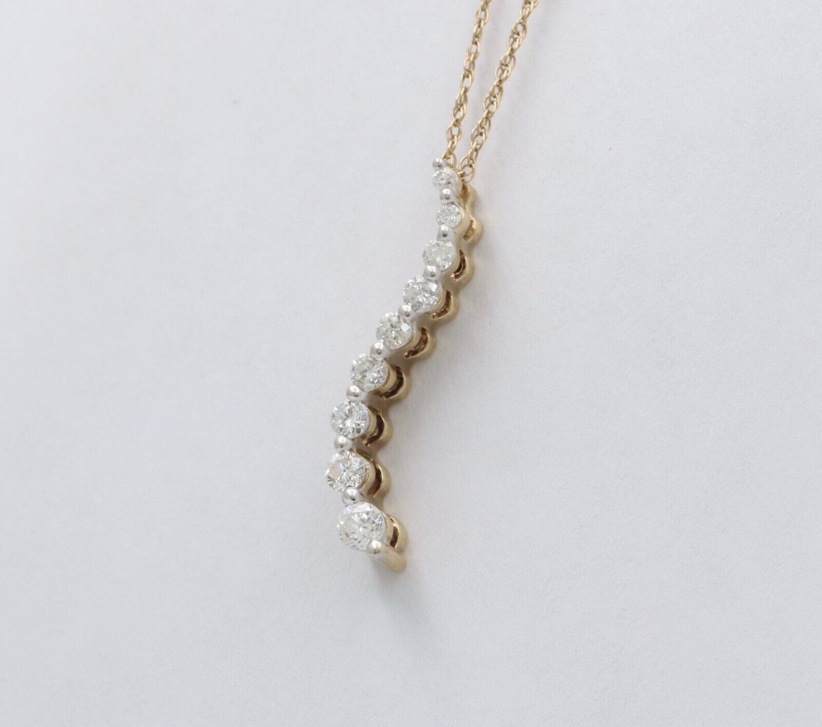 Vintage Diamond 14K Yellow Gold Curly Pendant.