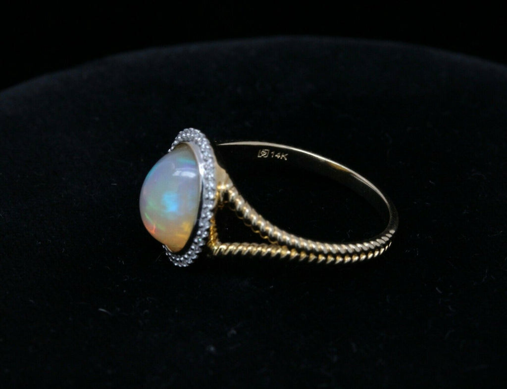 Vintage 14K Yellow Gold Opal and Diamond Halo Ring