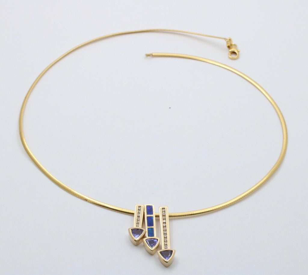 Striking 14K Gold Tanzanite, Opal and Diamond Three Arrows Pendant Necklace.