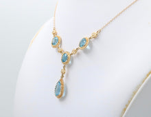 Load image into Gallery viewer, Vintage 14K Yellow Gold Teardrop Blue Zircon Festoon Necklace. Negligee Necklace
