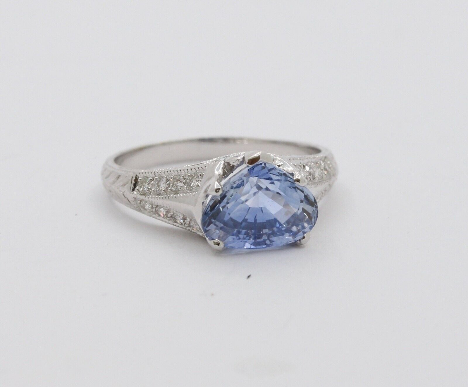 Uniquely Shaped Blue Sapphire and Diamonds 18K White Gold Ring