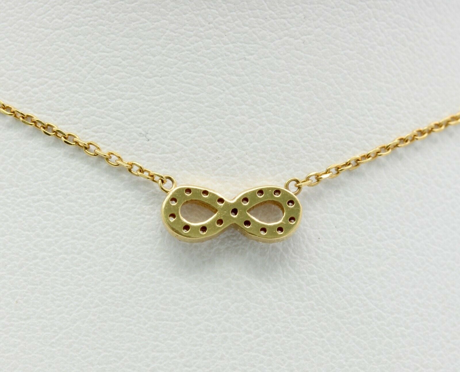 Cute 18K Yellow Gold Diamond Infinity Pendant
