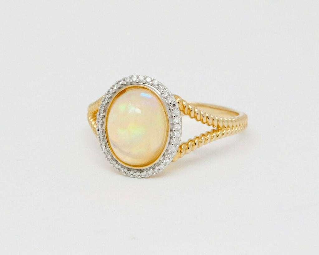 Vintage 14K Yellow Gold Opal and Diamond Halo Ring