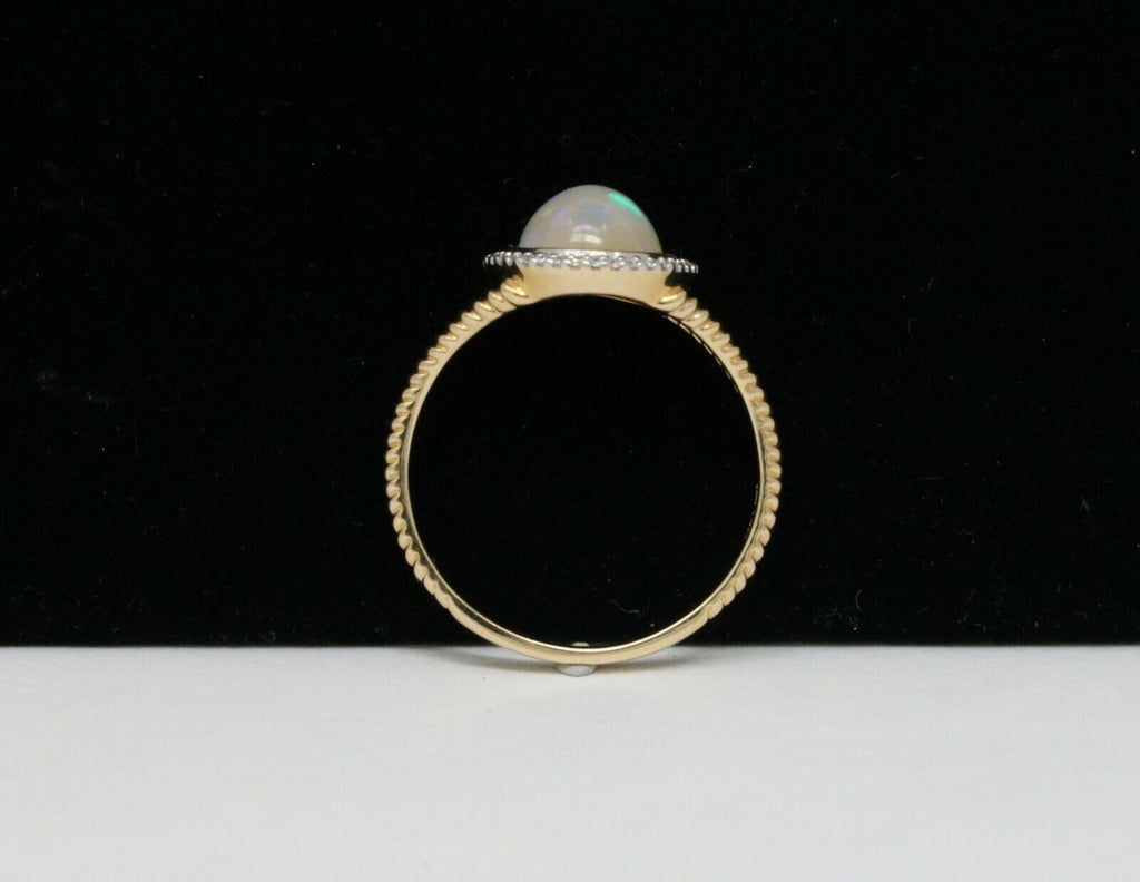 Vintage 14K Yellow Gold Opal and Diamond Halo Ring