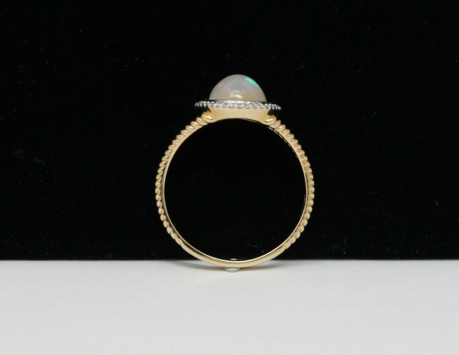 Vintage 14K Yellow Gold Opal and Diamond Halo Ring