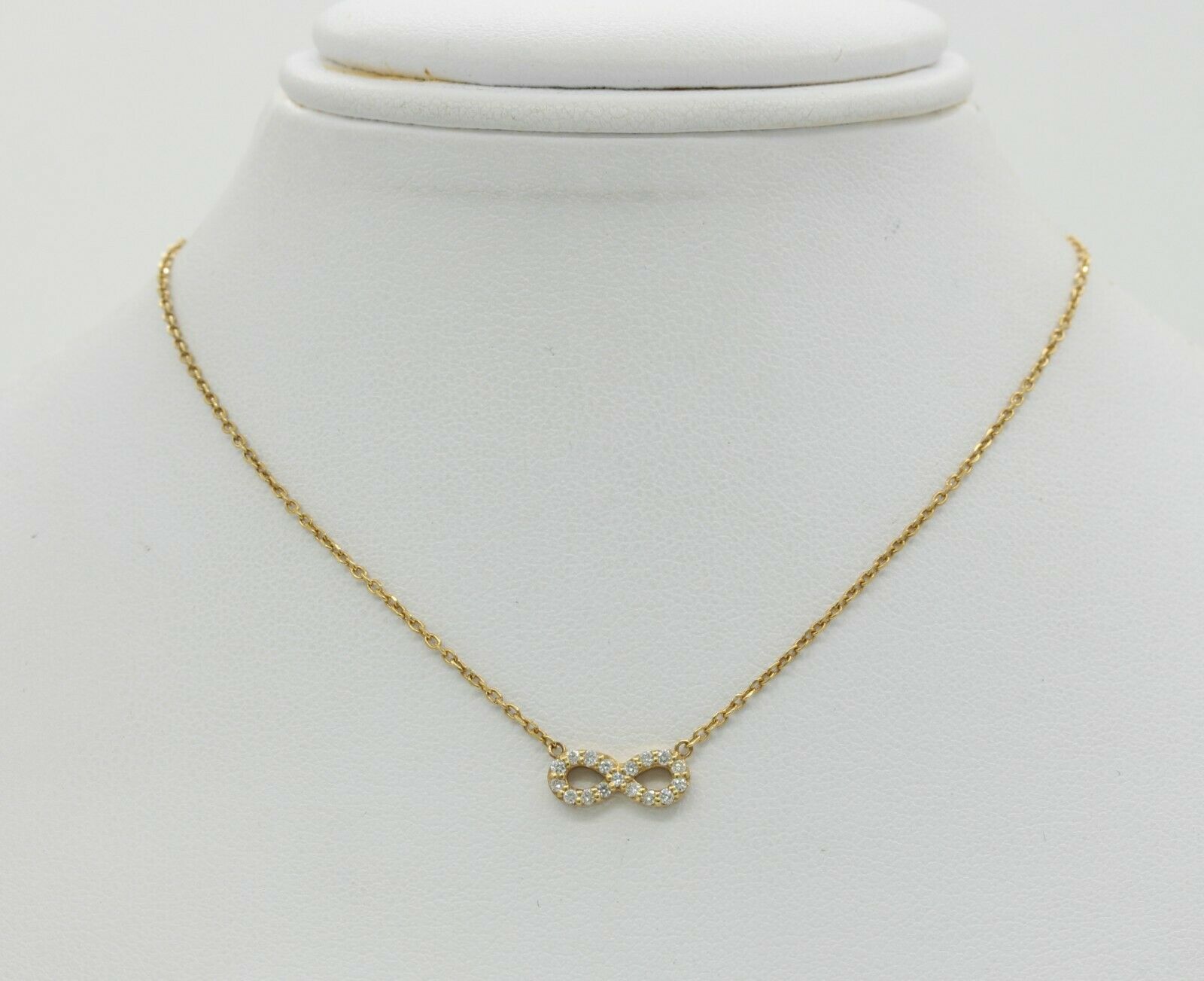 Cute 18K Yellow Gold Diamond Infinity Pendant