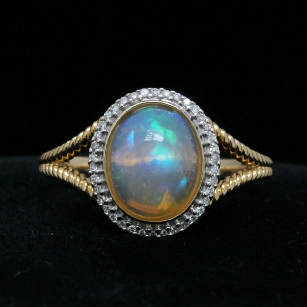 Vintage 14K Yellow Gold Opal and Diamond Halo Ring