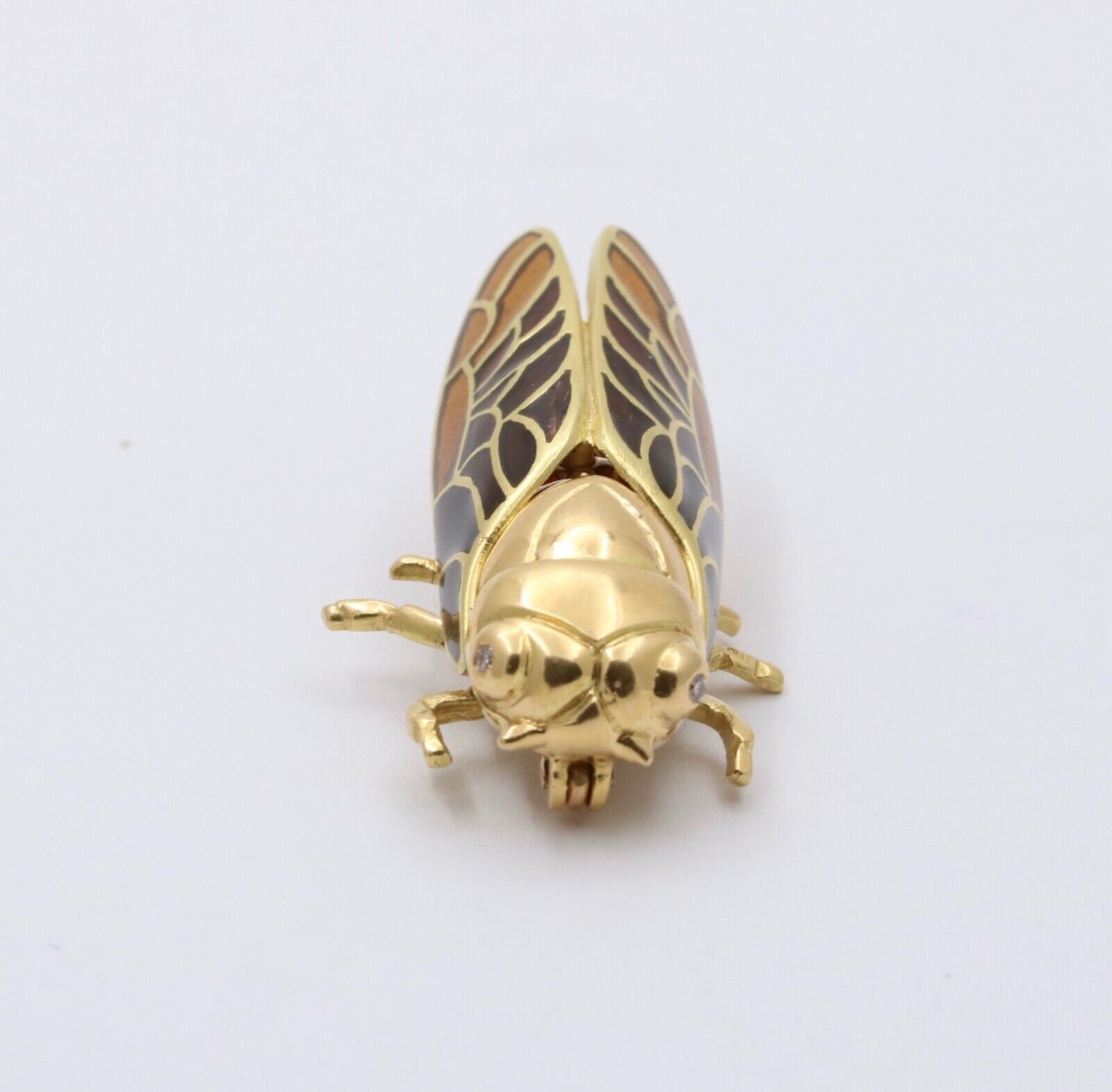 The Handcrafted 18K Yellow Gold Plique A Jour Cicada Diamond Brooch.