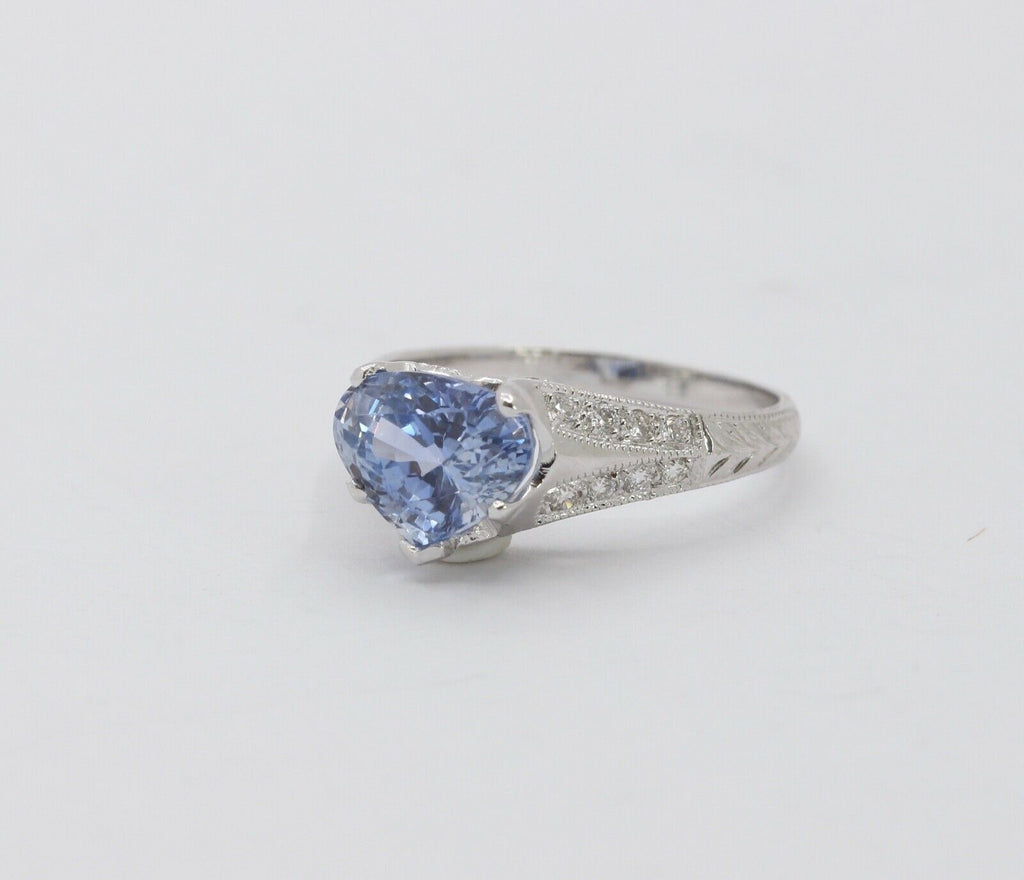 Uniquely Shaped Blue Sapphire and Diamonds 18K White Gold Ring