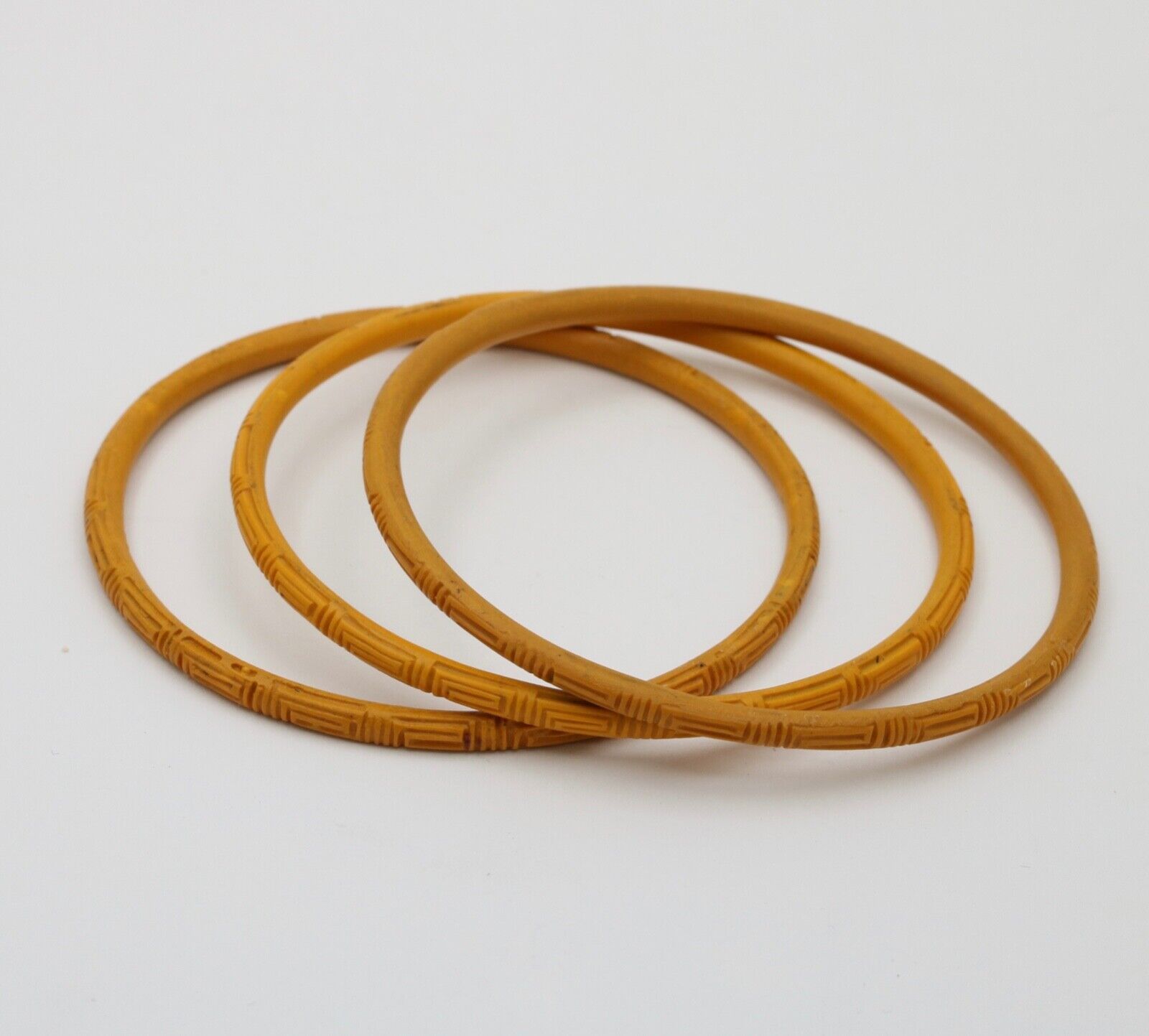 Vintage 1960’s Carved Mustard Yellow Set Four Bangles