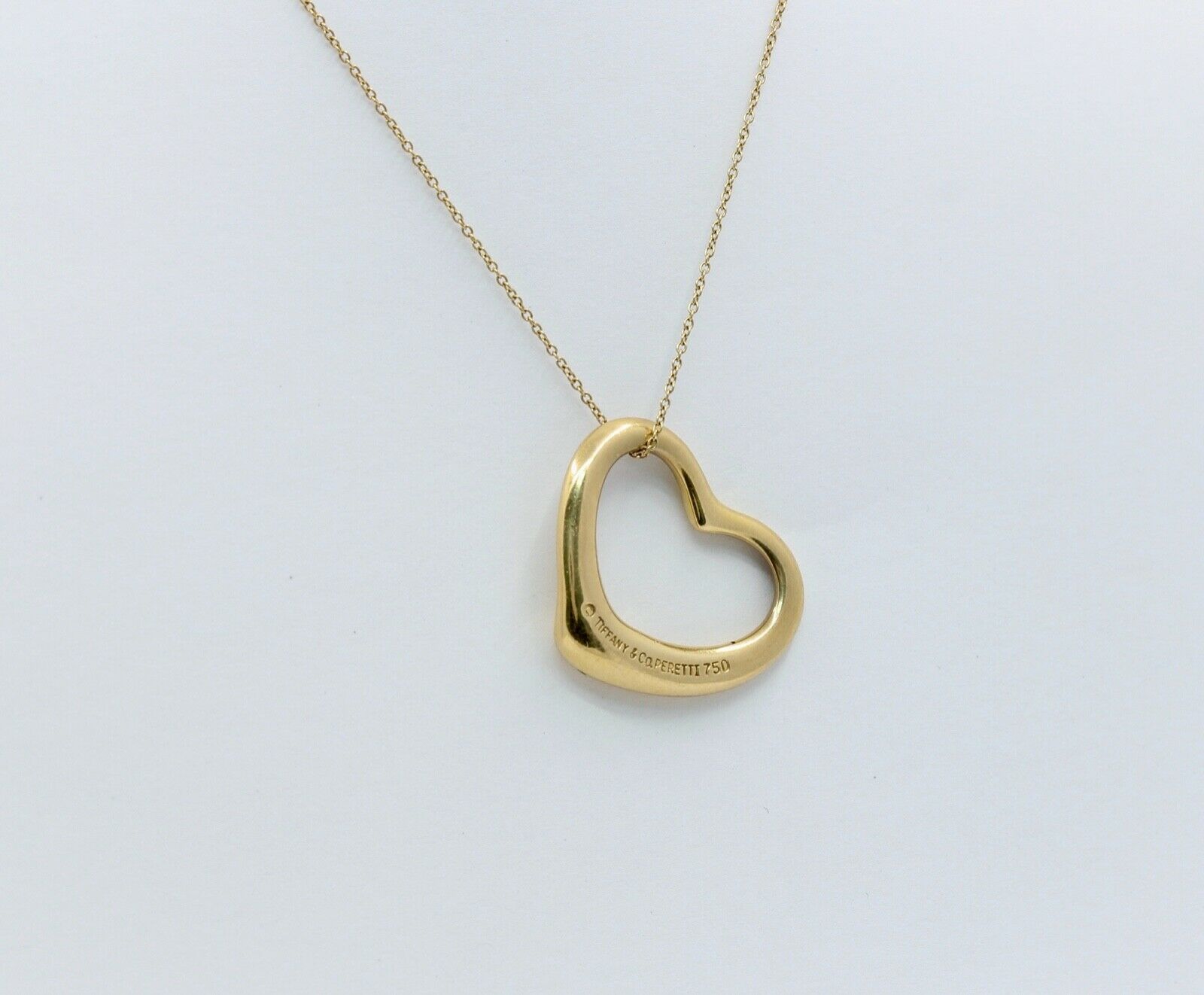 Tiffany and Co Elsa Peretti Floating Heart Pendant and Chain 18K Yellow Gold