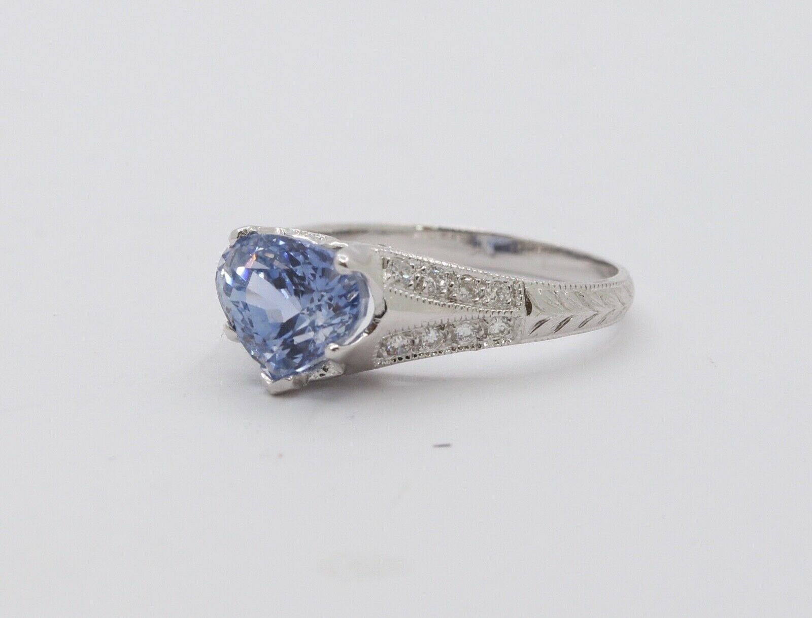 Uniquely Shaped Blue Sapphire and Diamonds 18K White Gold Ring