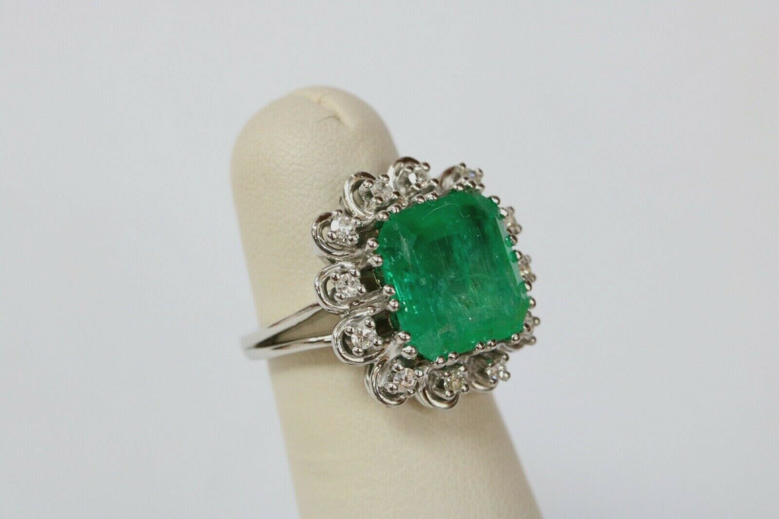 Vintage Emerald Cut Columbian Emerald Diamonds Platinum Ring