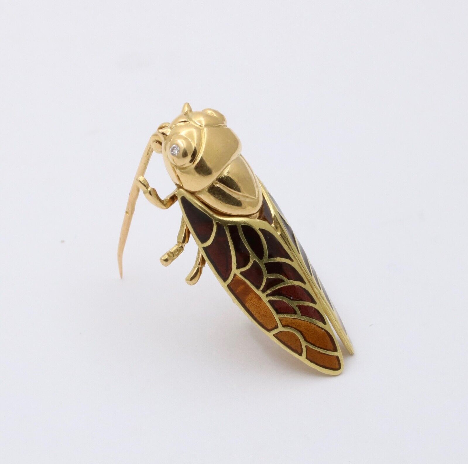 The Handcrafted 18K Yellow Gold Plique A Jour Cicada Diamond Brooch.