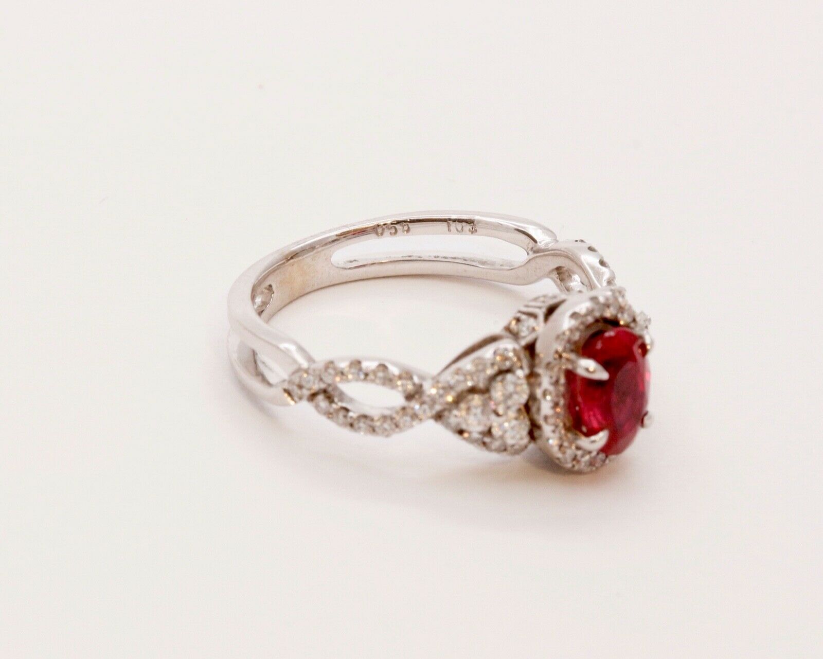 Elegant Crossover Ruby Diamonds Engagement Ring