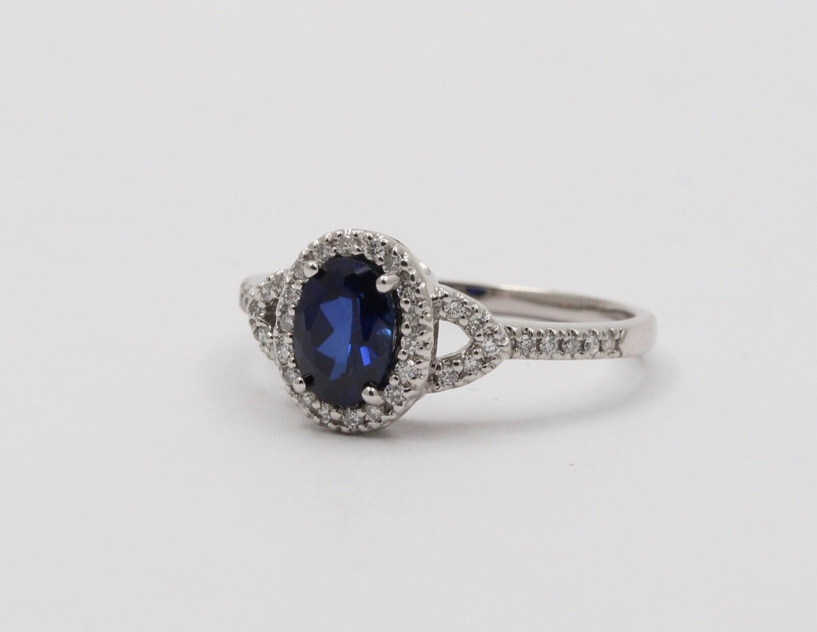 Vintage Cushion Cut Sapphire and Diamond Halo 14K White Gold Ring