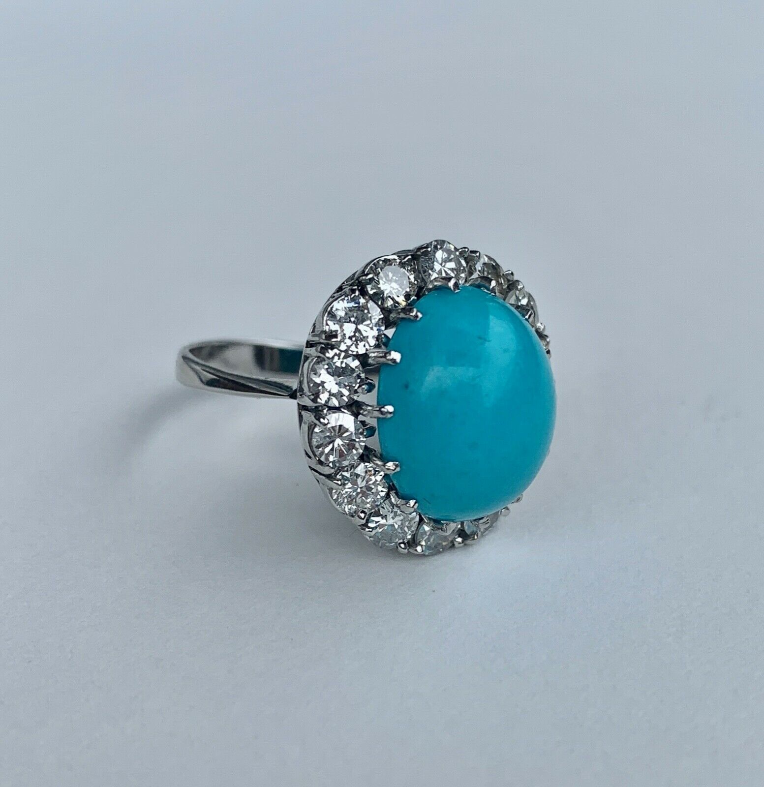 Gorgeous Vintage Persian turquoise Platinum Ring With Diamonds Halo.