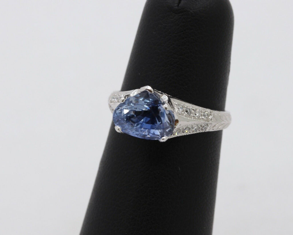 Uniquely Shaped Blue Sapphire and Diamonds 18K White Gold Ring