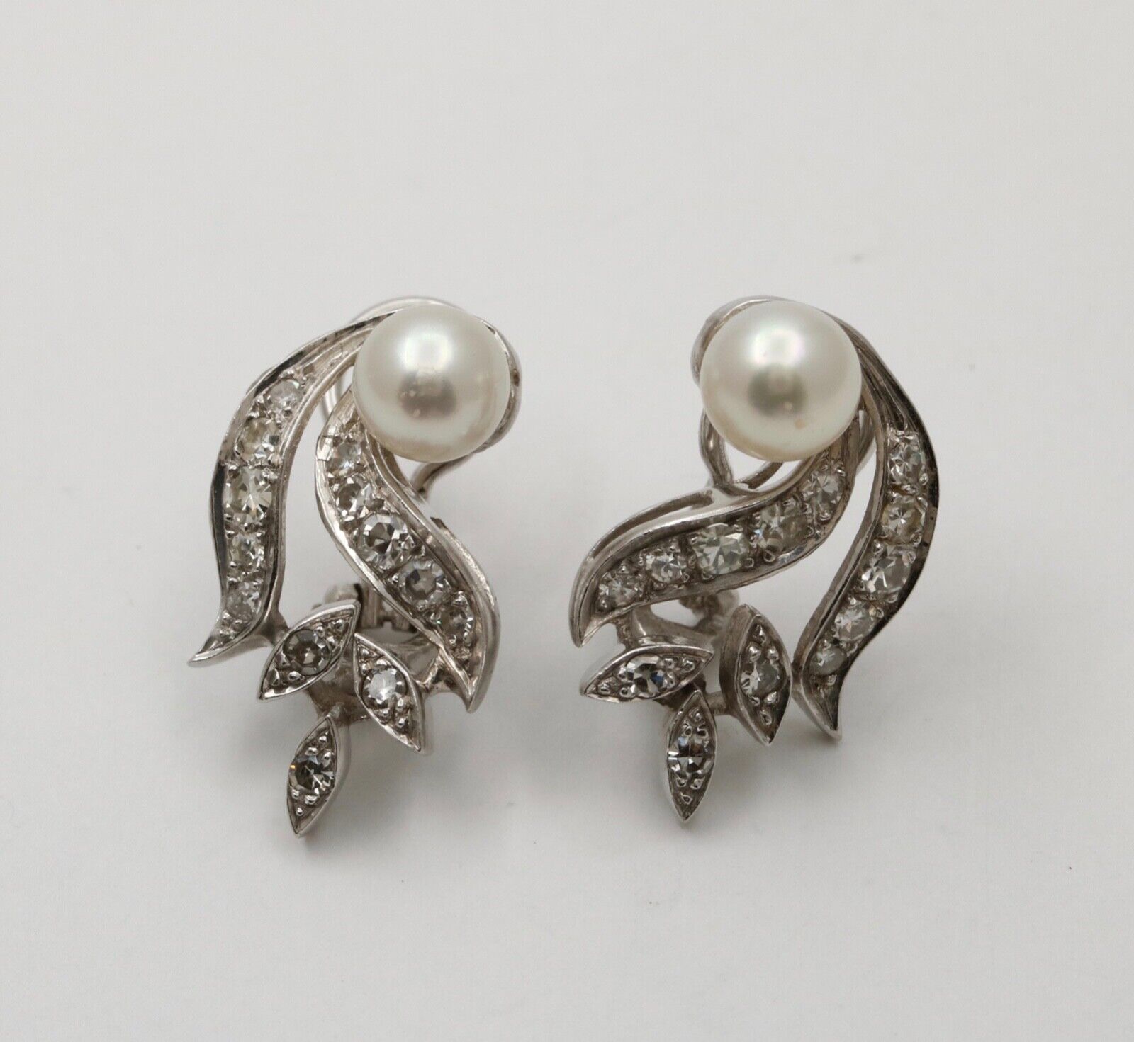 Elegant Vintage 14K Gold Pearl and Diamond Clip Earrings.
