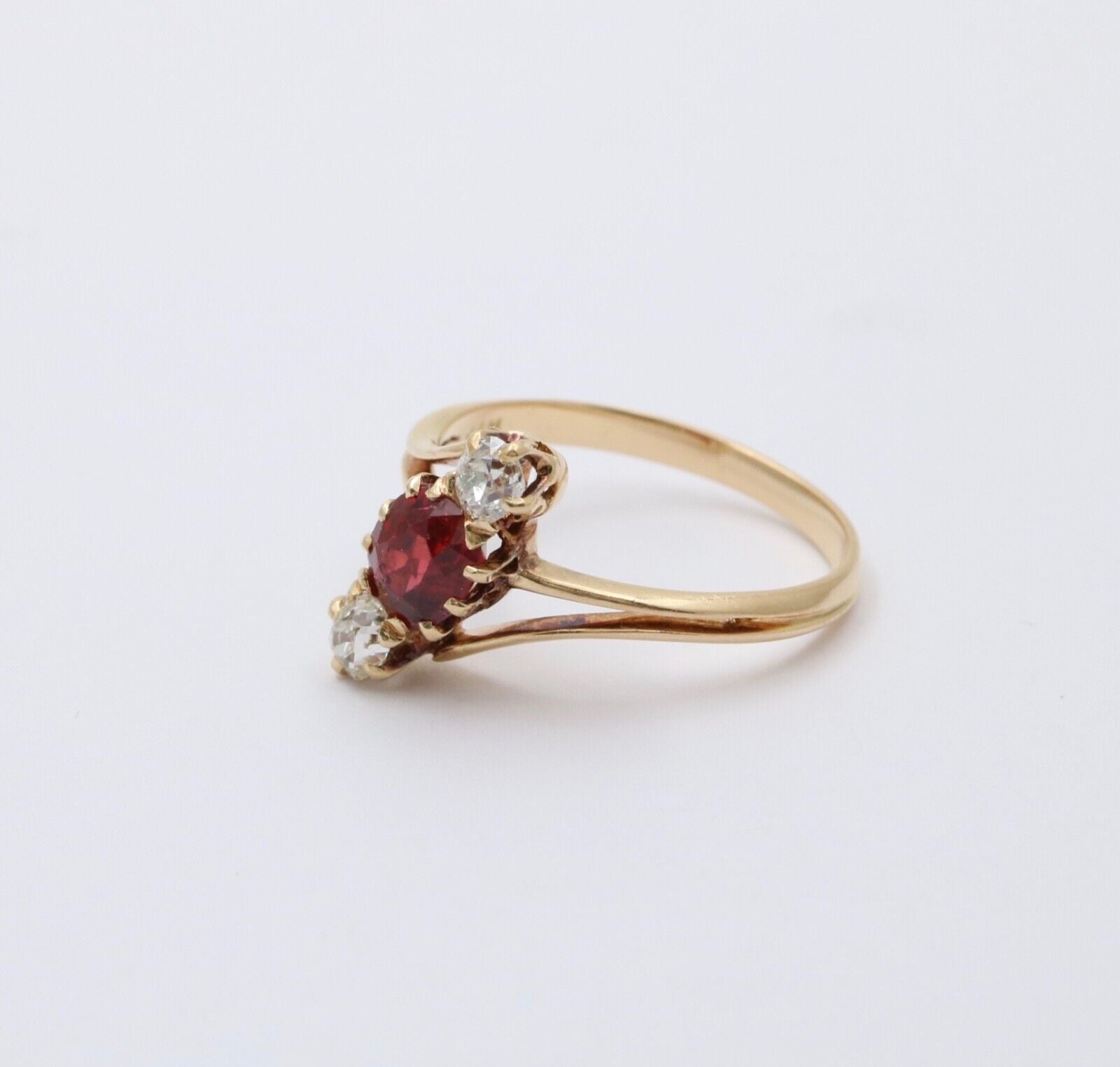 Antique 18K Yellow Gold Ruby And Diamond Bypass Three Stone Ring