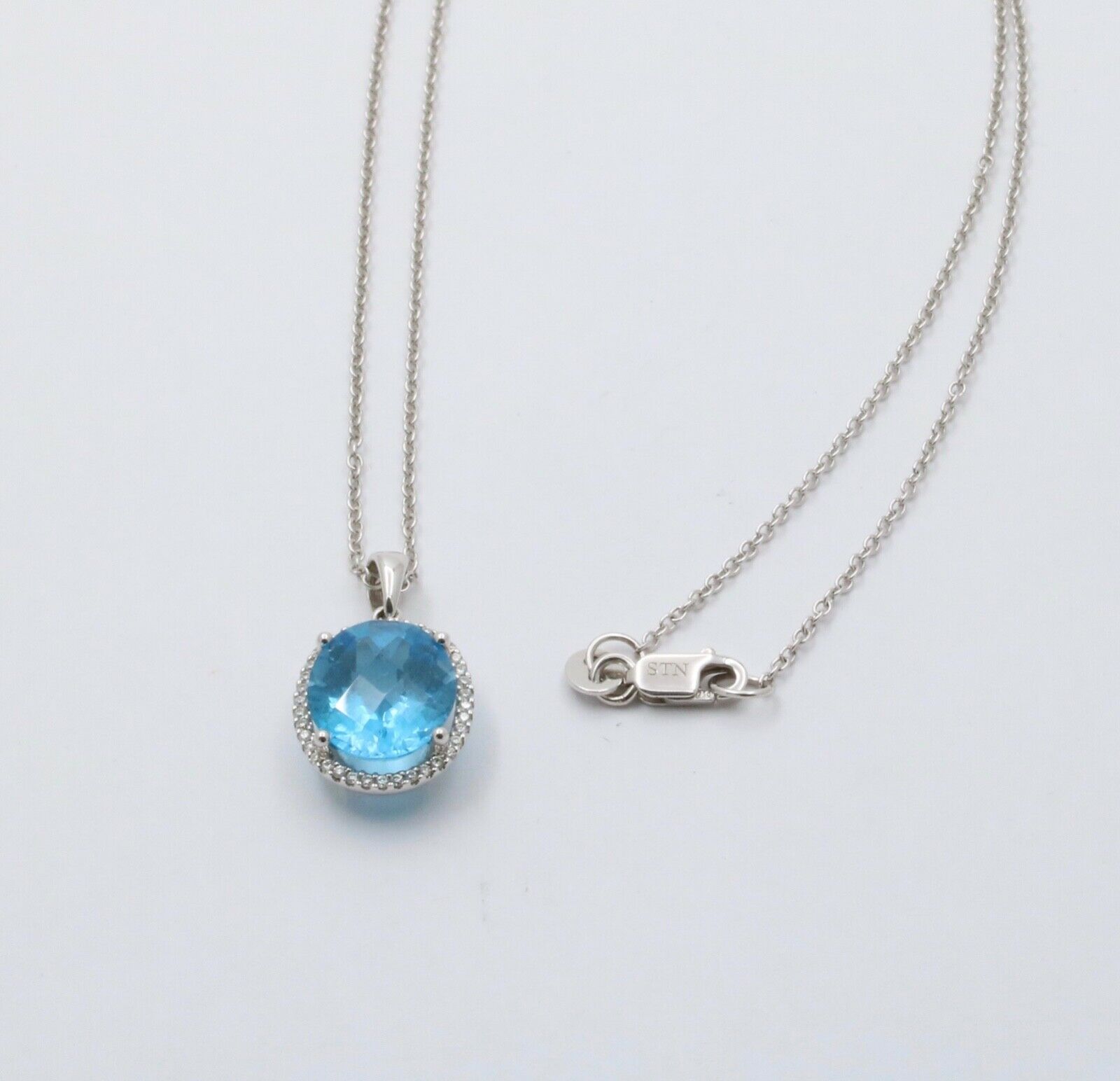 Classic 14K White Gold blue Topaz Diamond Halo Pendant Necklace.