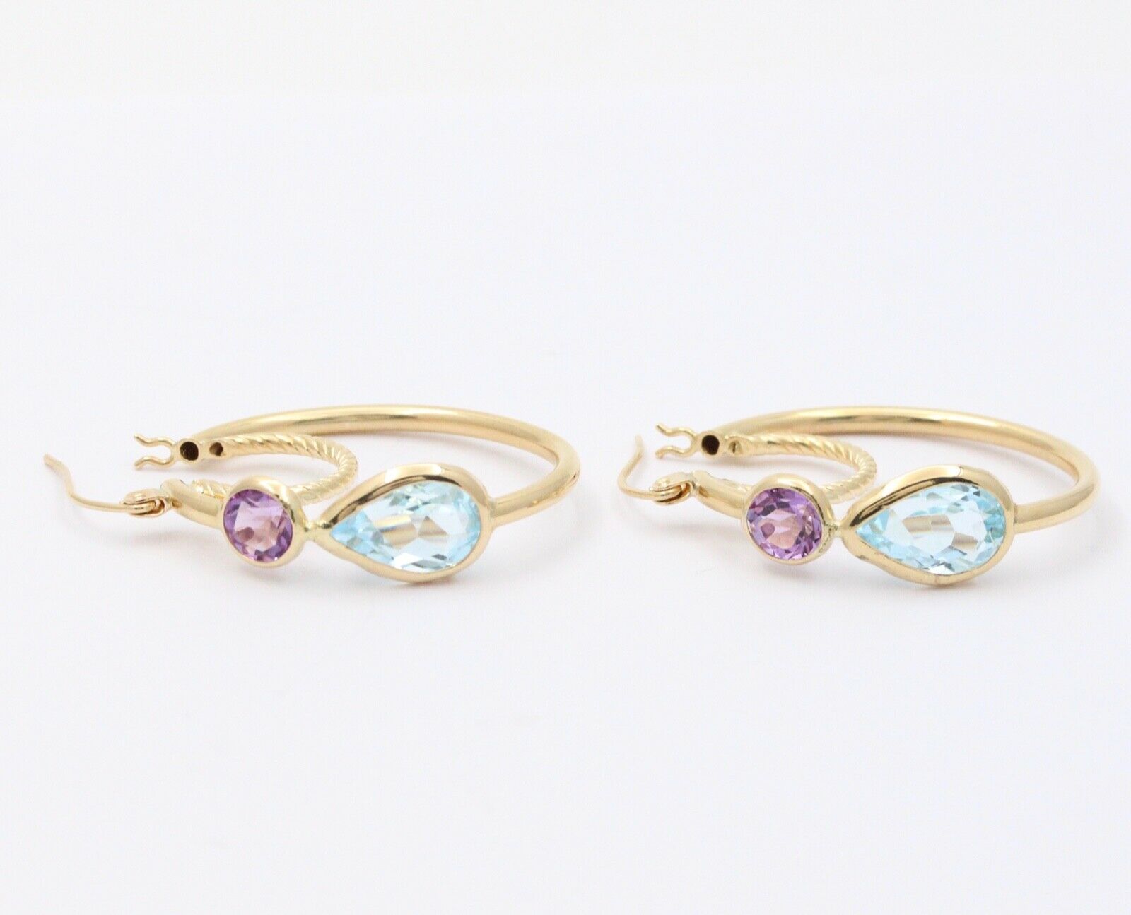 Minimalist 14K Yellow Gold Blue Topaz & Amethyst Huggie Earrings.