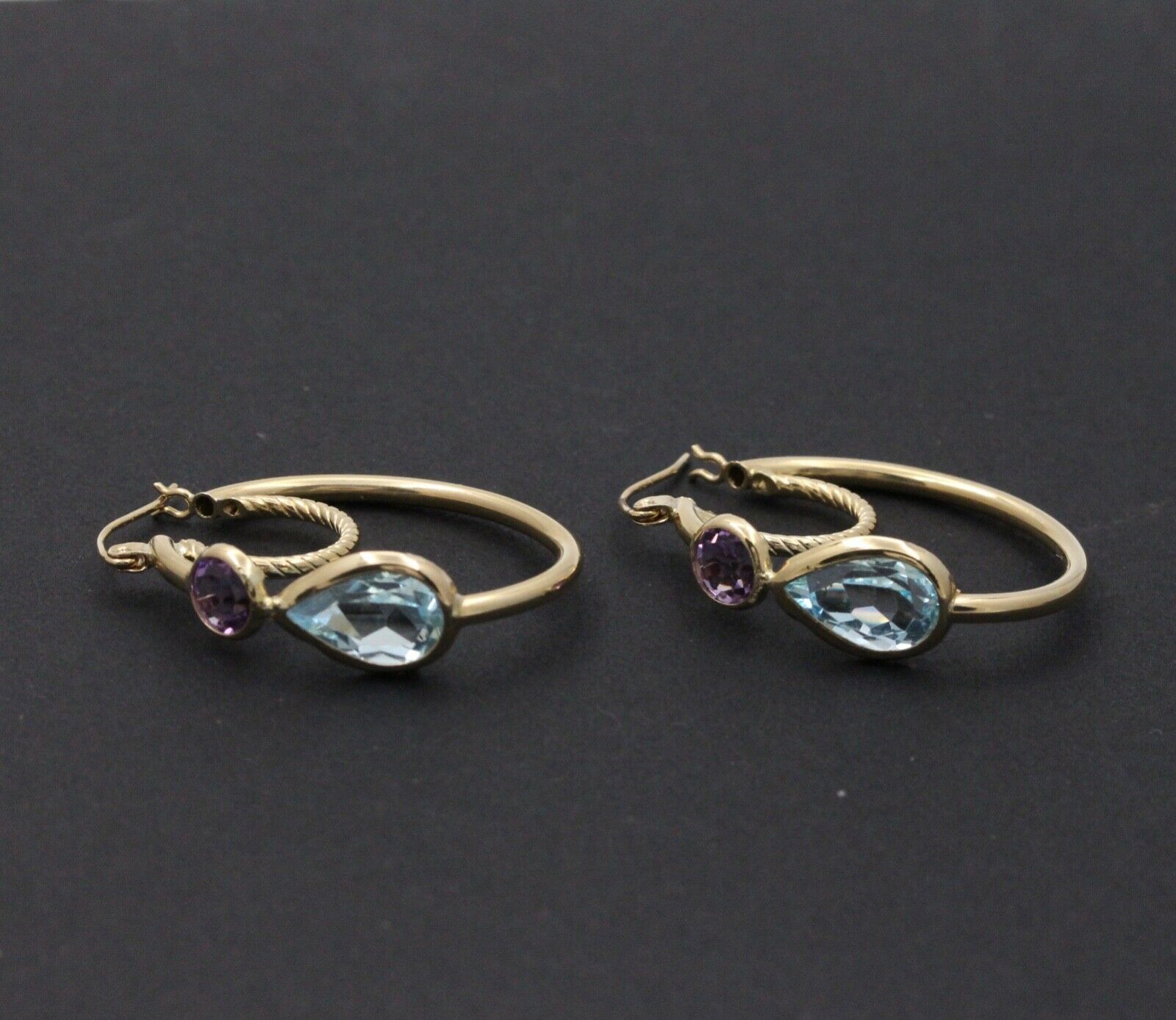 Minimalist 14K Yellow Gold Blue Topaz & Amethyst Huggie Earrings.