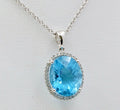 Classic 14K White Gold blue Topaz Diamond Halo Pendant Necklace.