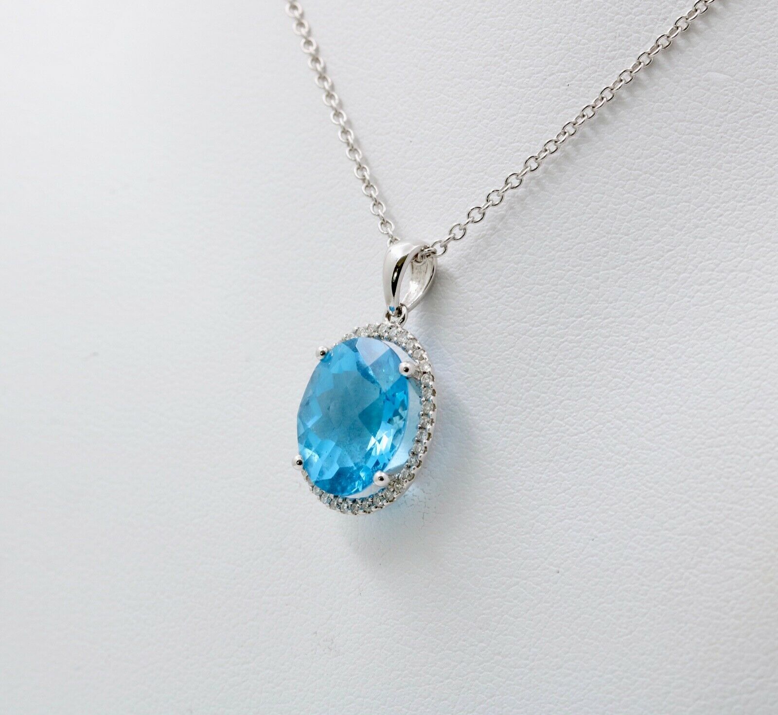 Classic 14K White Gold blue Topaz Diamond Halo Pendant Necklace.