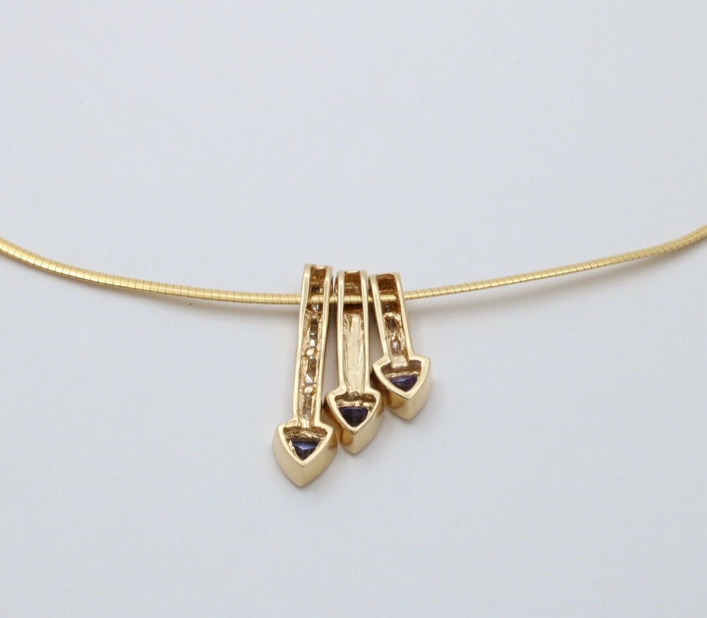 Striking 14K Gold Tanzanite, Opal and Diamond Three Arrows Pendant Necklace.