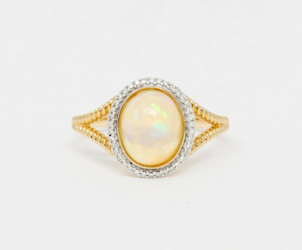 Vintage 14K Yellow Gold Opal and Diamond Halo Ring