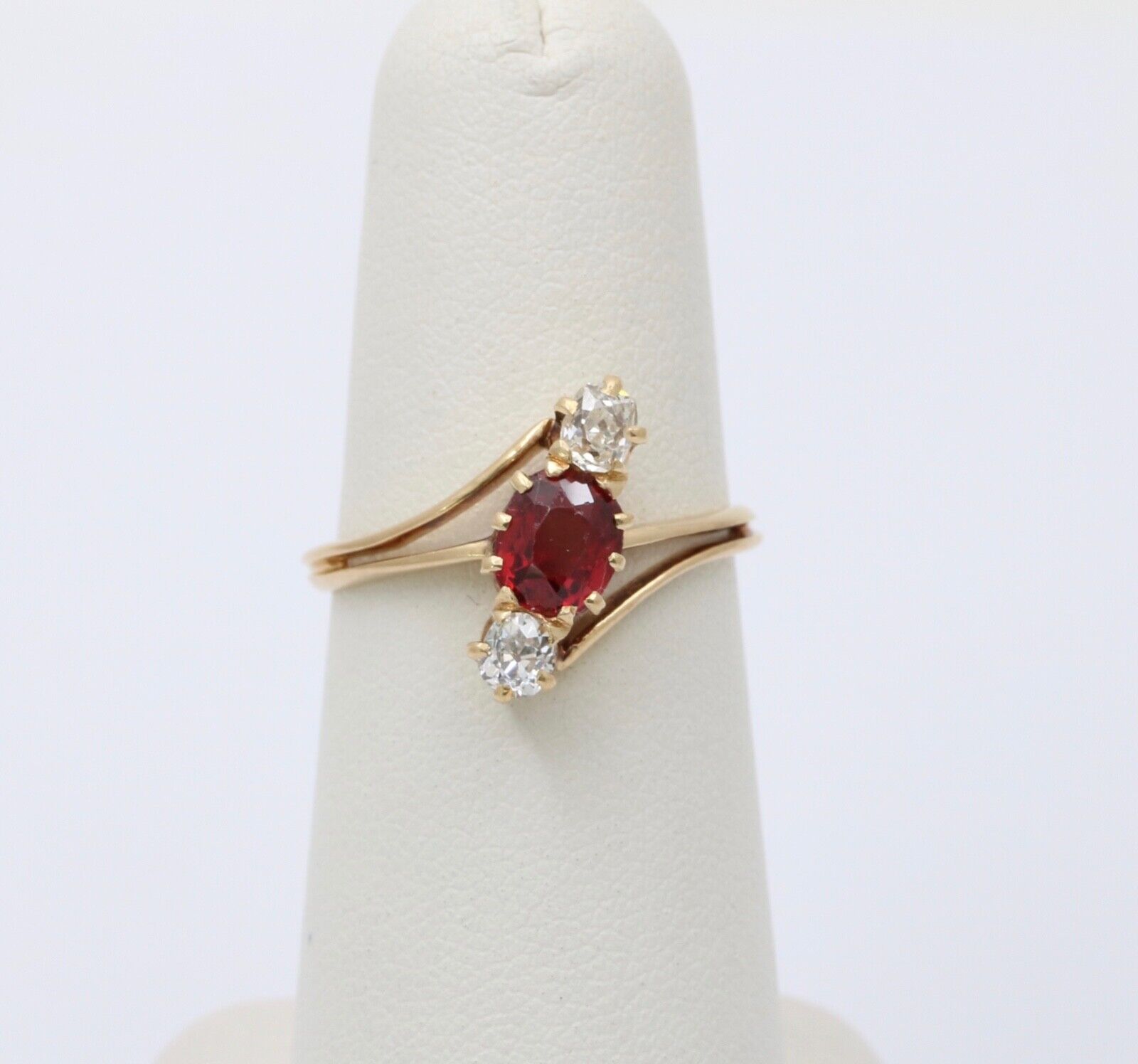 Antique 18K Yellow Gold Ruby And Diamond Bypass Three Stone Ring