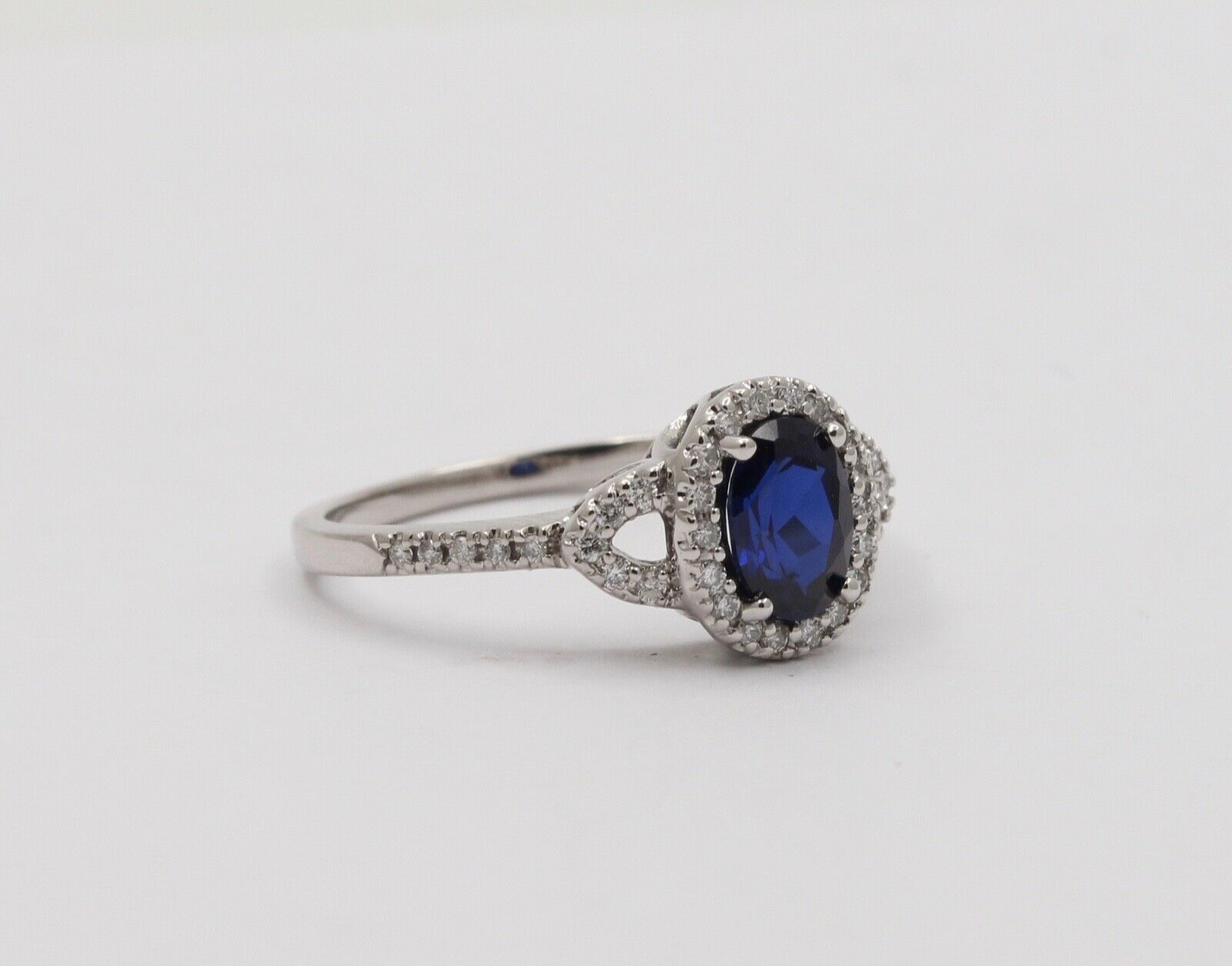Vintage Cushion Cut Sapphire and Diamond Halo 14K White Gold Ring