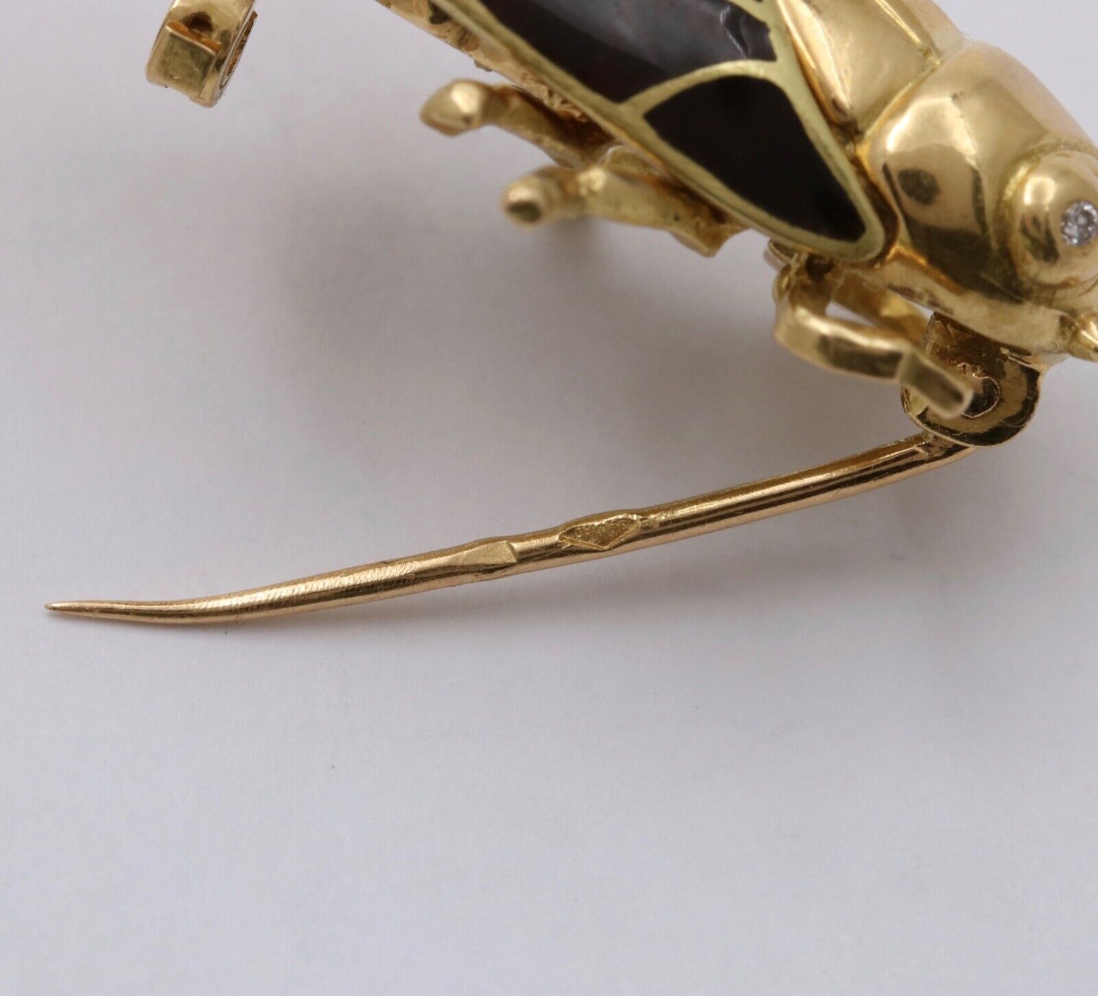 The Handcrafted 18K Yellow Gold Plique A Jour Cicada Diamond Brooch.