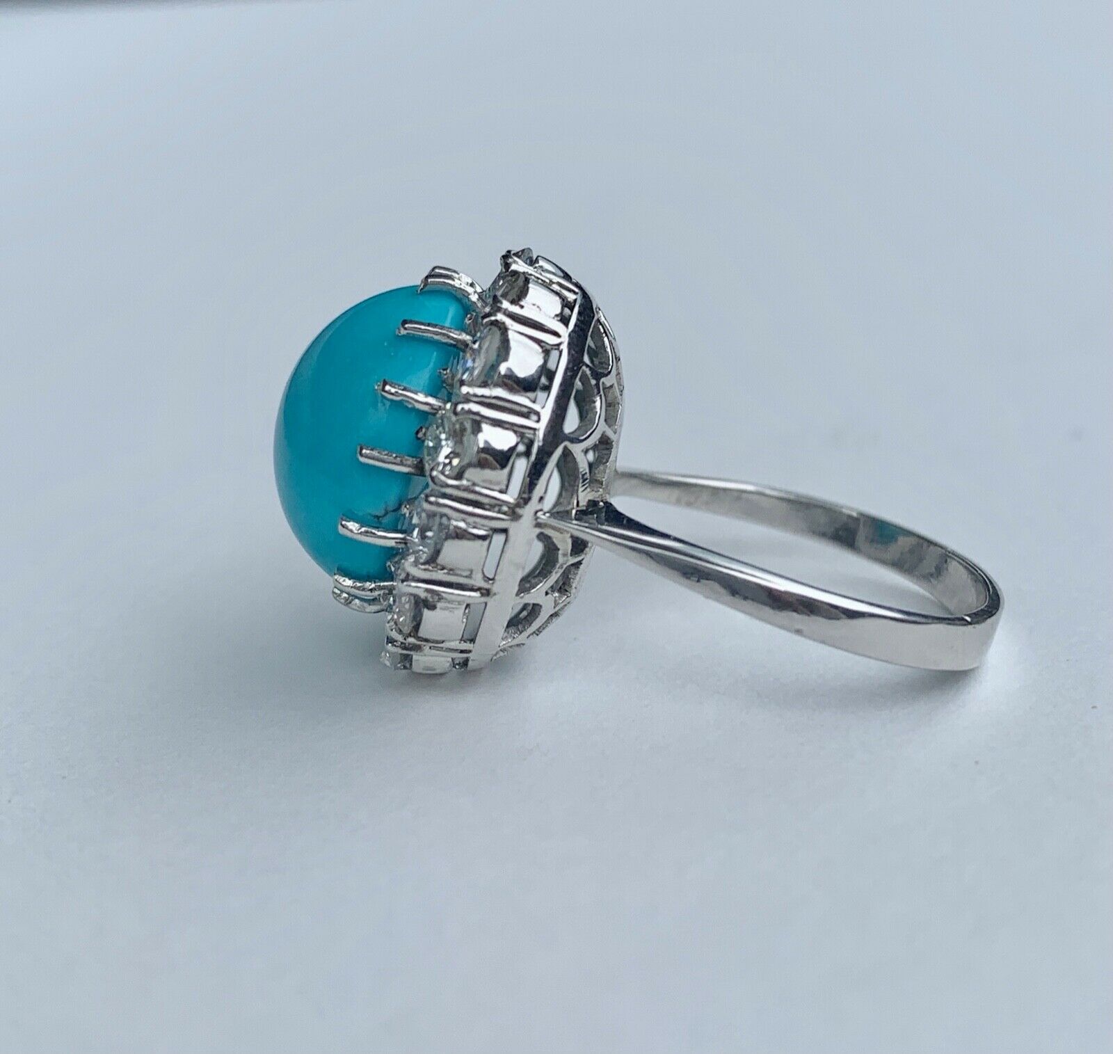 Gorgeous Vintage Persian turquoise Platinum Ring With Diamonds Halo.